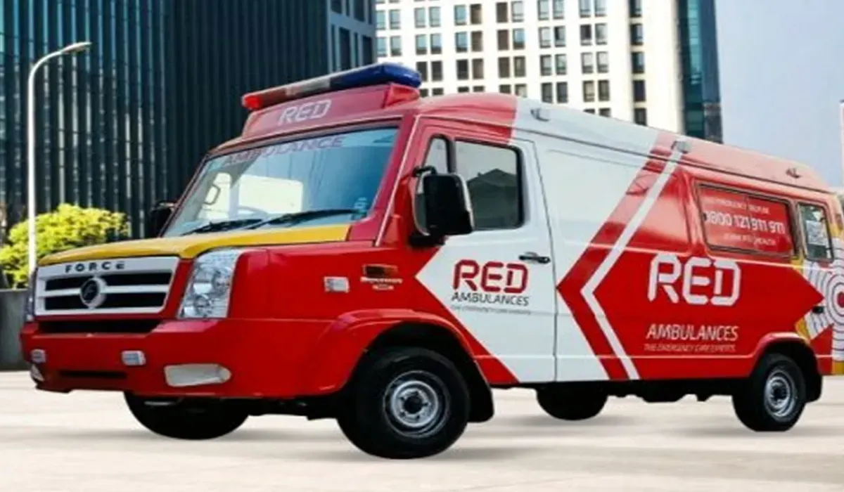Red Health ambulance with paramedics