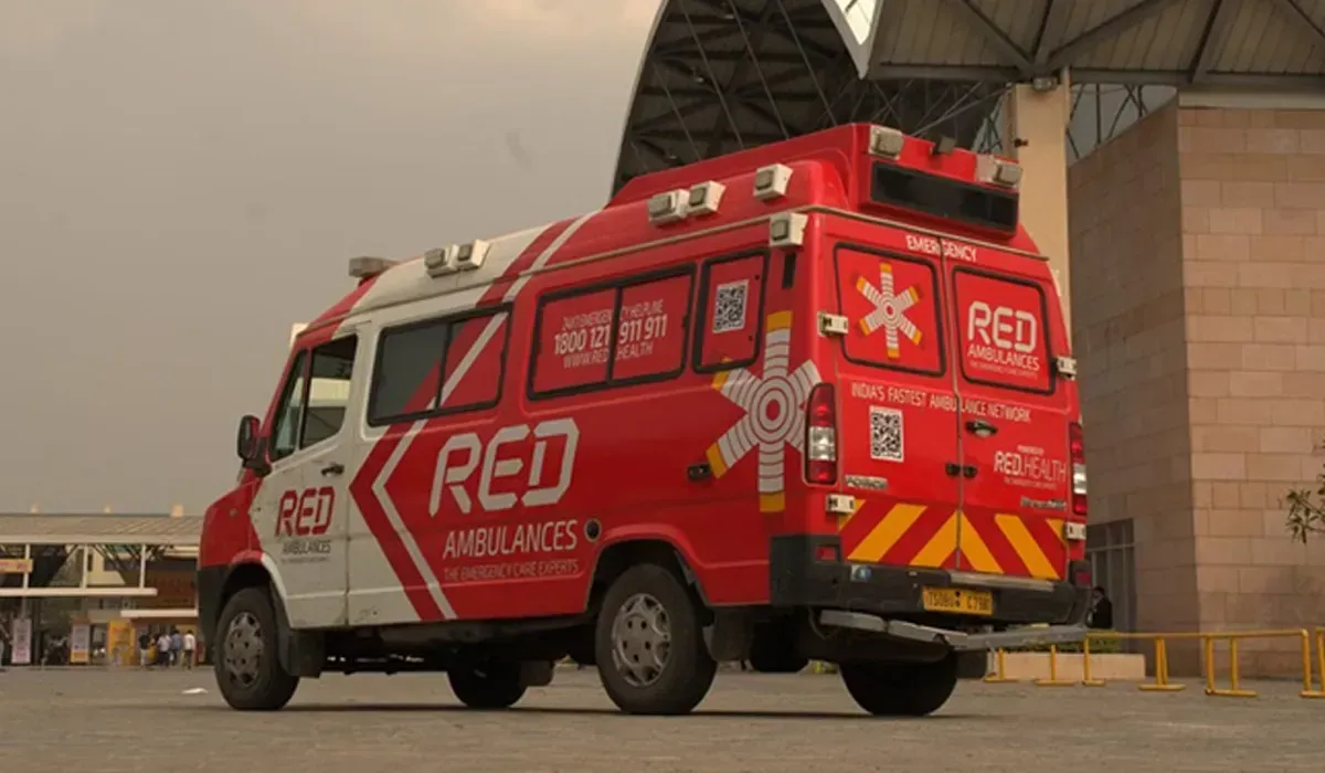 Red Health ambulance with paramedics